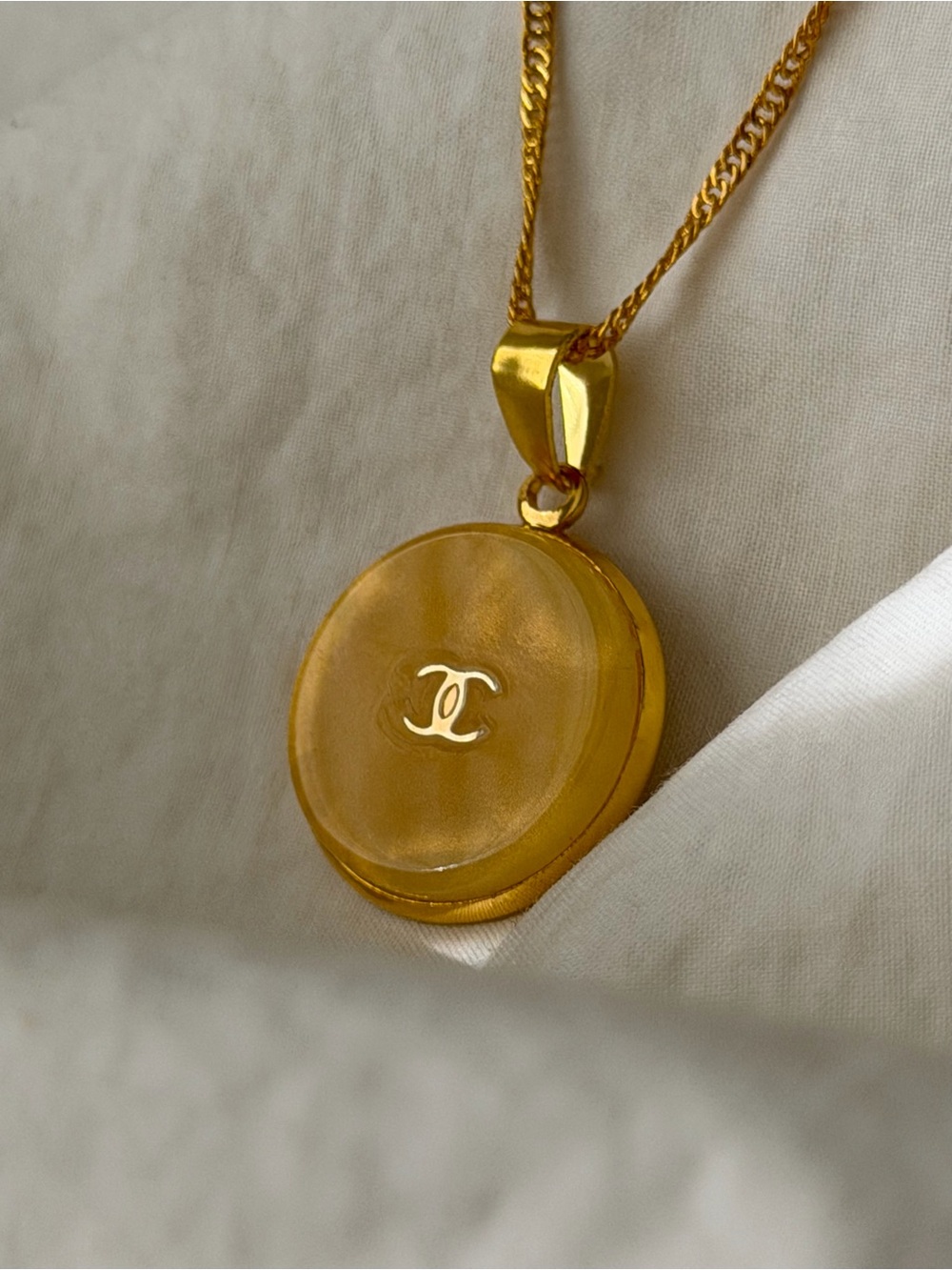 CHANEL Gold Round CC Pendant Necklace